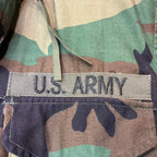 【店頭販売のみ】US（米軍放出品）US M-65 フィールドジャケット ウッドランド パッチ付き [中古]